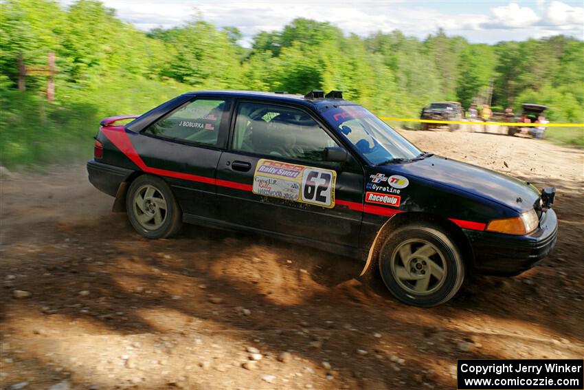 Joe Boburka / Elizabeth Unglenieks-Ploeg Ford Escort on SS5, Chainsaw Junksin.