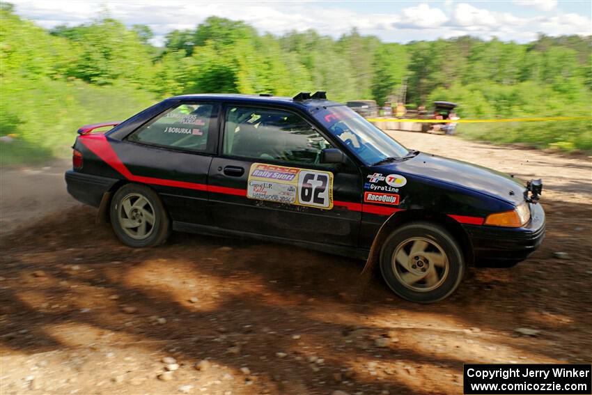 Joe Boburka / Elizabeth Unglenieks-Ploeg Ford Escort on SS5, Chainsaw Junksin.