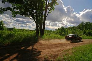 Joe Boburka / Elizabeth Unglenieks-Ploeg Ford Escort on SS5, Chainsaw Junksin.