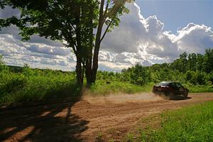 Joe Boburka / Elizabeth Unglenieks-Ploeg Ford Escort on SS5, Chainsaw Junksin.