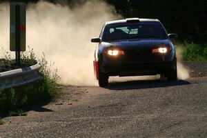 Gary Klein / Sam Strickhouser Saturn Ion Redline on SS6, Camp 3 South.