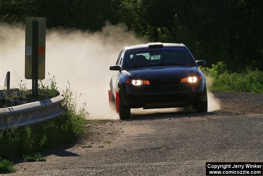 Gary Klein / Sam Strickhouser Saturn Ion Redline on SS6, Camp 3 South.