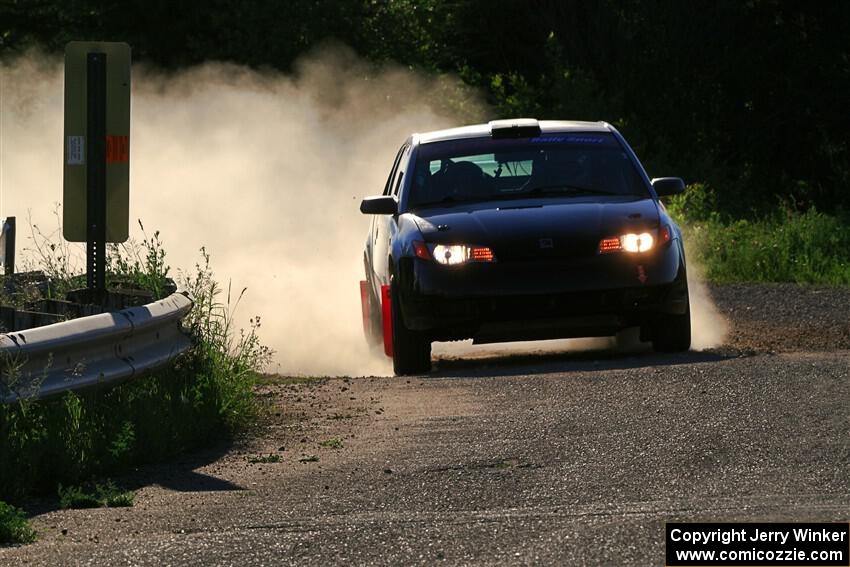 Gary Klein / Sam Strickhouser Saturn Ion Redline on SS6, Camp 3 South.
