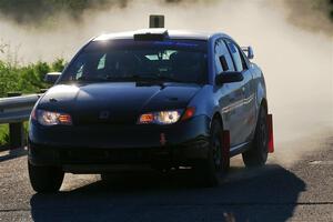 Gary Klein / Sam Strickhouser Saturn Ion Redline on SS6, Camp 3 South.