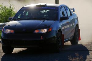 Gary Klein / Sam Strickhouser Saturn Ion Redline on SS6, Camp 3 South.