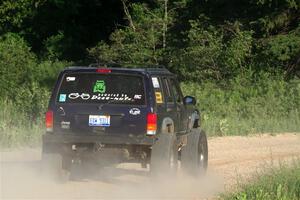 A Jeep Wrangler sweeps SS6, Camp 3 South.