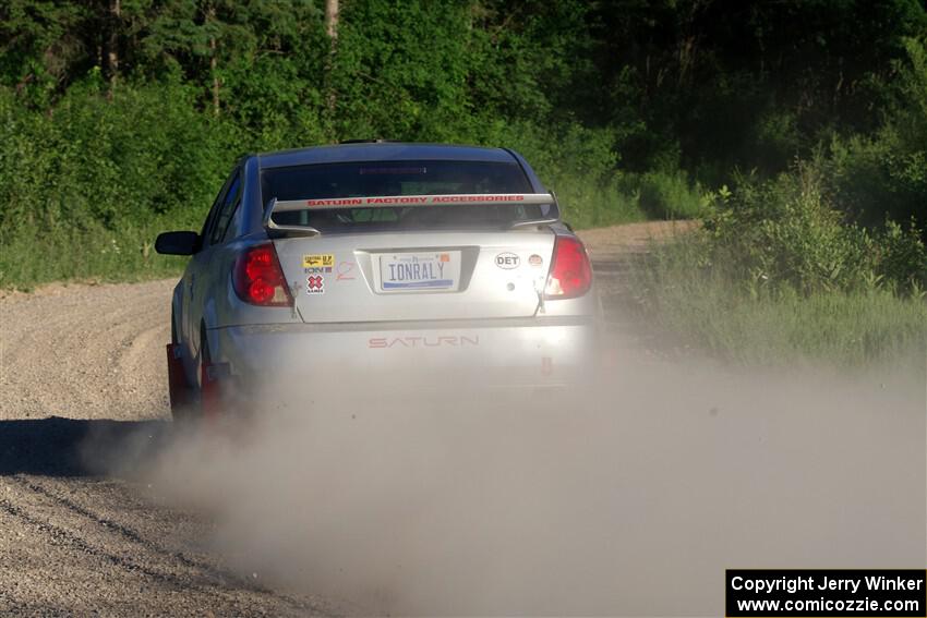 Gary Klein / Sam Strickhouser Saturn Ion Redline on SS6, Camp 3 South.
