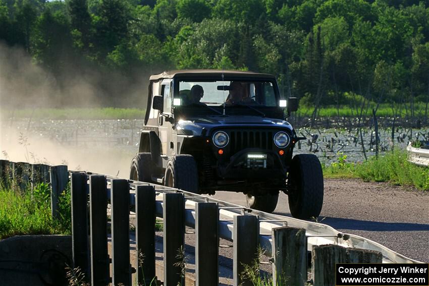 A Jeep Wrangler sweeps SS6, Camp 3 South.