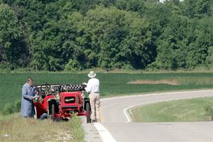 Gregory Gumtow's 1904 Overland is stopped on a hill just before Kingston.