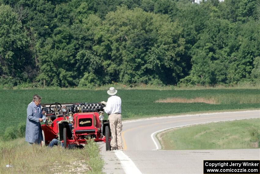 Gregory Gumtow's 1904 Overland is stopped on a hill just before Kingston.