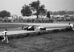 The #39 Sting Formula Vee of Steven Driscoll tangles with another car in turn 5.