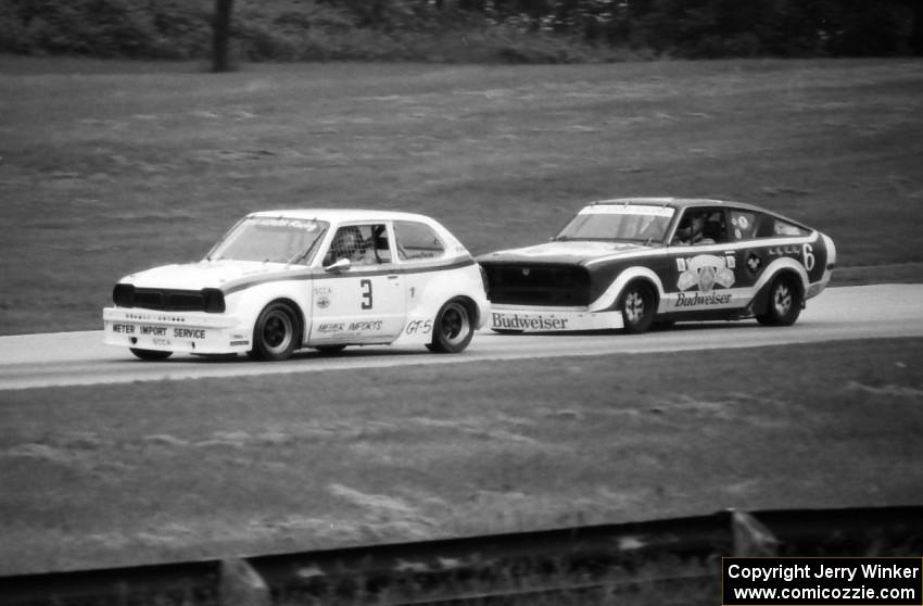 Carl Liebich's GT-5 Honda Civic ahead of Jerry Clinton's GT-4 Datsun B210