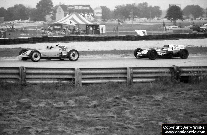 Bill Bowman's Caracal D and Franz Fleischli's Stiletto Formula Vees battle uphill out of turn 5.