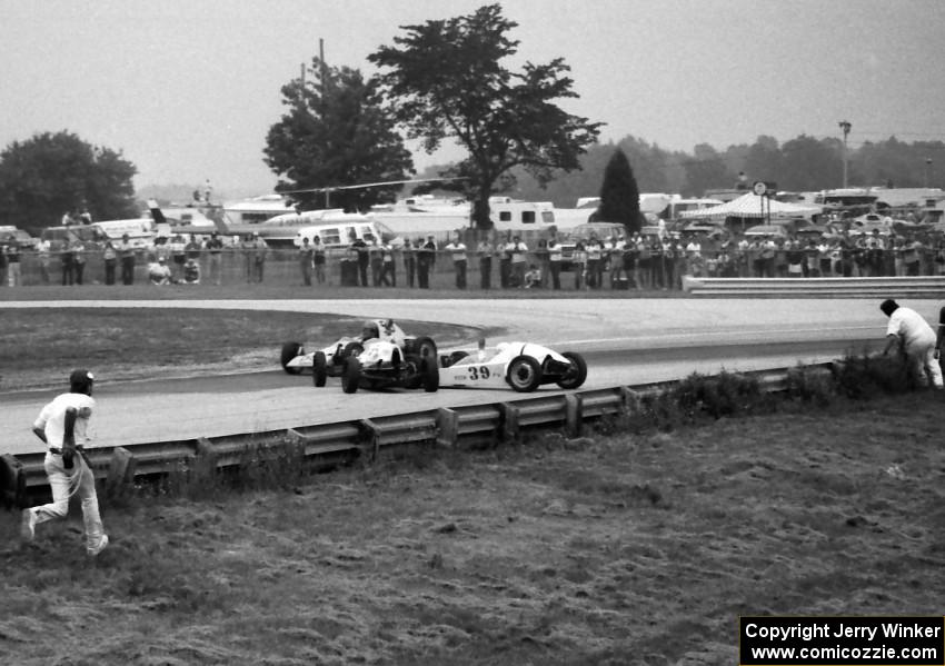 The #39 Sting Formula Vee of Steven Driscoll tangles with another car in turn 5.