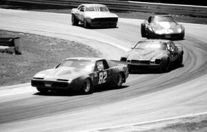 Duane Smith's Pontiac Firebird, Howard Nardick's Chevy Camaro, Jim Sanborn's Chevy Corvette and Jerry Dunbar's Chevy Camaro