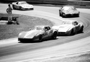 Don Sak's Chevy Corvette leads Tuck Thomas's Chevy Corvette, Jerry Hansen's Pontiac Trans-Am and Doug Rippie's Chevy Corvette