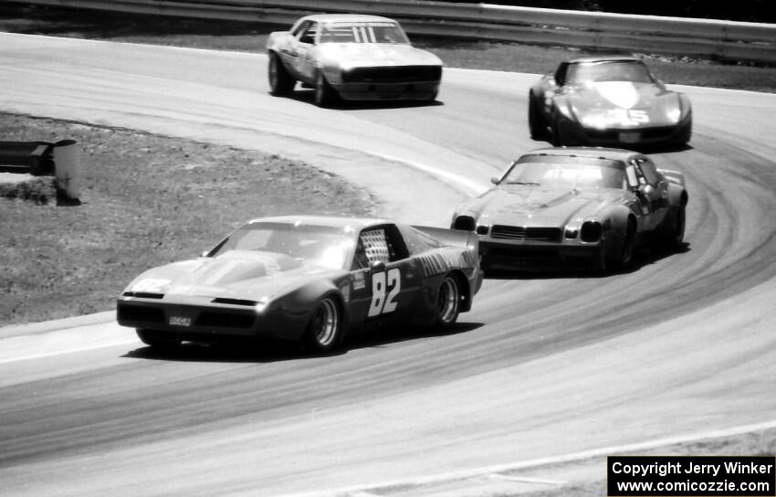 Duane Smith's Pontiac Firebird, Howard Nardick's Chevy Camaro, Jim Sanborn's Chevy Corvette and Jerry Dunbar's Chevy Camaro