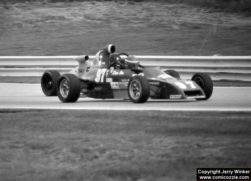 Formula Ford race: Steve Ice's Lola T-642 is passed by Curtis Farley's Reynard 83F