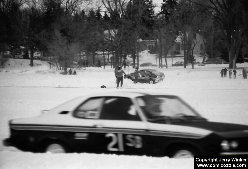 The (3) Leighton Reese / Duane Wagner VW Scirocco is stuffed while the (21) Bob Coatsworth / Rich Hall Opel Manta passes by.