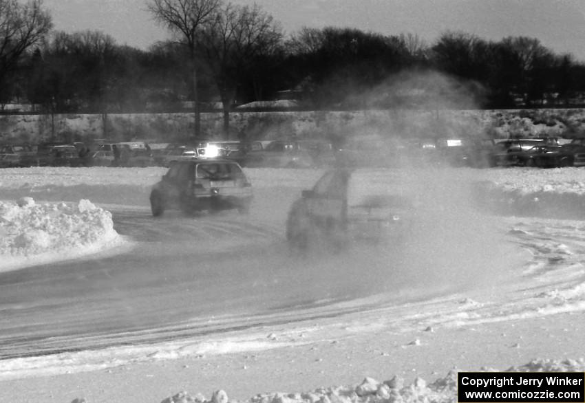 The Terry Orr VW GTI is chased by the Adam Popp / Denny Popp Dodge Colt Turbo.