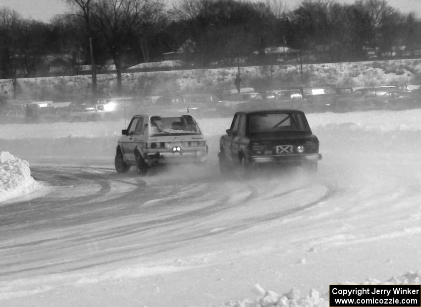 The Herm Johnson / John Menard VW GTI leads the Ray Hoeper / Cliff Ebben Fiat 128 through a corner.