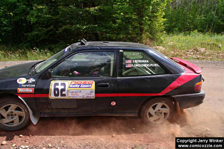 Joe Boburka / Elizabeth Unglenieks-Ploeg Ford Escort on SS3, Norway Home.