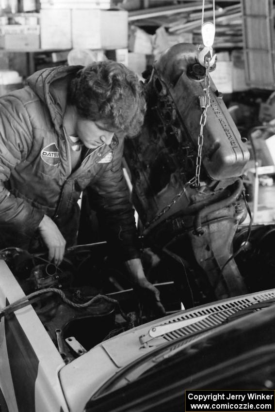 Engine work being done to the Dave Strot / Mike Winker Datsun 510 before the race.