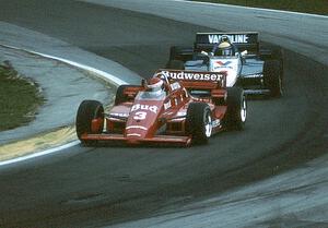 Bobby Rahal's March 85C/Cosworth ahead of Roberto Moreno's March 85C/Cosworth