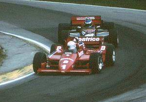 Alan Jones's Lola T-900/Cosworth ahead of Raul Boesel's March 85C/Cosworth