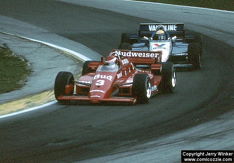Bobby Rahal's March 85C/Cosworth ahead of Roberto Moreno's March 85C/Cosworth