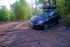 The photographer's car, parked on an outcropping on the Norway stage.