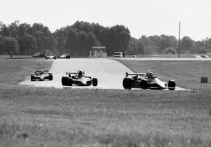 Five Ralt RT4s stream through turns 6 and 7 during practice.