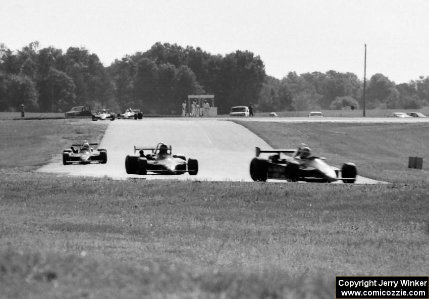 Five Ralt RT4s stream through turns 6 and 7 during practice.