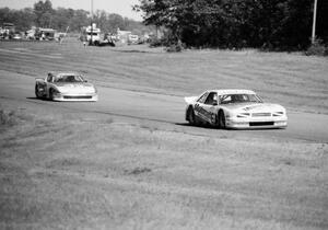 John Jones's Mercury Capri leads Paul Newman's Nissan 300ZX Turbo