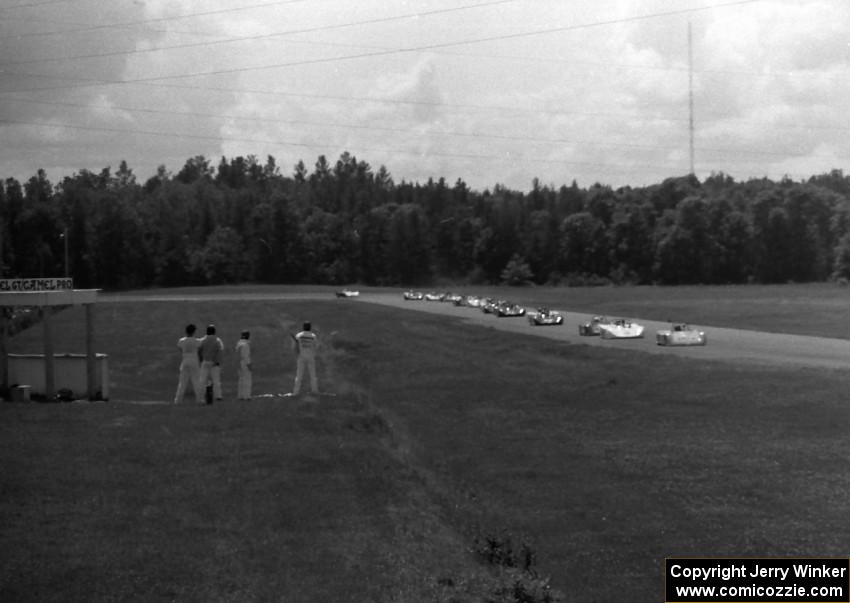 The field streams out of turn 5 into 6 on the first lap of the race.