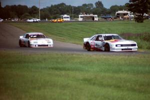 Roush cars lead lap two: Scott Pruett's Mercury Capri leads Pete Halsmer's Merkur XR4Ti