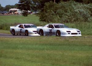 The Protofab Chevy Camaros of Jim Miller (28) and Greg Pickett (8)