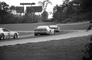 The three Protofab Chevy Camaros at turn 6 during Saturday's race.