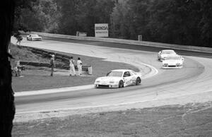 Pete Halsmer's Merkur XR4Ti, the Chevy Camaros of Wally Dallenbach, Jr. and Greg Pickett and Chris Kneifel's Mercury Capri