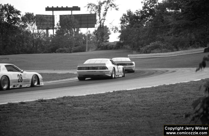 The three Protofab Chevy Camaros at turn 6 during Saturday's race.