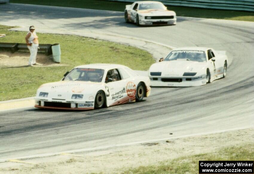 Pete Halsmer's Merkur XR4Ti, Wally Dallenbach, Jr.'s Chevy Camaro and Chris Kneifel's Mercury Capri