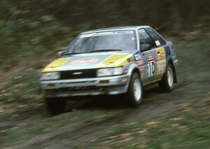 Richey Watanabe / Howie Watanabe blast down SS2 in their Gr. A Toyota Corolla GTS.