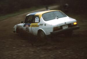 The Rick Corwine / Dave Somerfleck SAAB 99 prepares for a right-hander at the first spectator point.