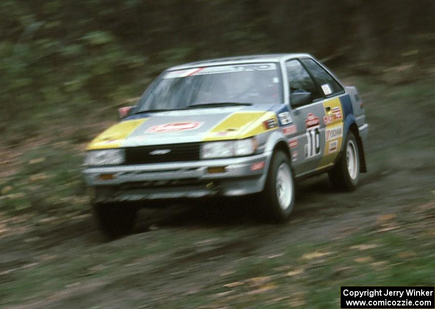 Richey Watanabe / Howie Watanabe blast down SS2 in their Gr. A Toyota Corolla GTS.