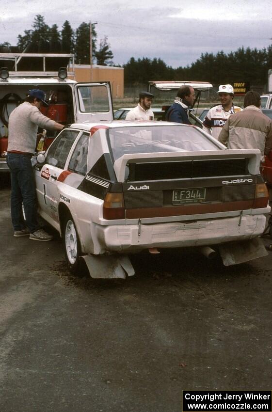 John Buffum/Tom Grimshaw's Audi Sport Quattro at service. Note a young Paul Choinere in the Michelin suit talking to JB.