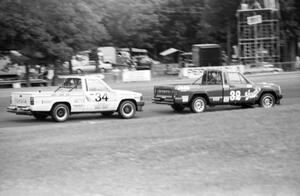 Bobby Archer's Jeep Comanche leads Steve Lewis' Toyota Pickup during the race.
