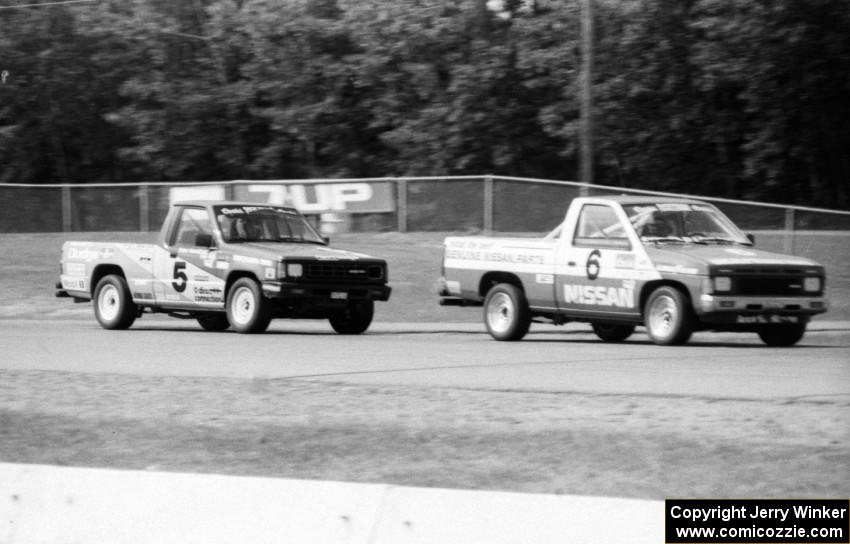 Max Jones' Nissan Pickup holds off Peter Farrell's Dodge D-50 during the race.
