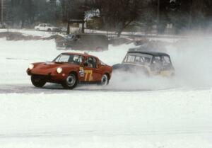 Dan Page's SAAB Sonett II battles Terry Orr's Austin Mini Cooper S.