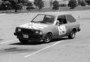 Ron Hirabayashi in Jerry Winker's Mazda GLC