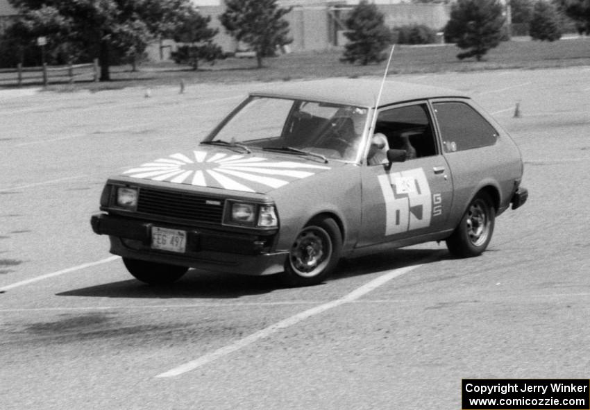 Ron Hirabayashi in Jerry Winker's Mazda GLC